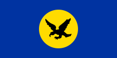 1975 Solomon Islands flag proposal: blue with a yellow circle containing a black frigatebird